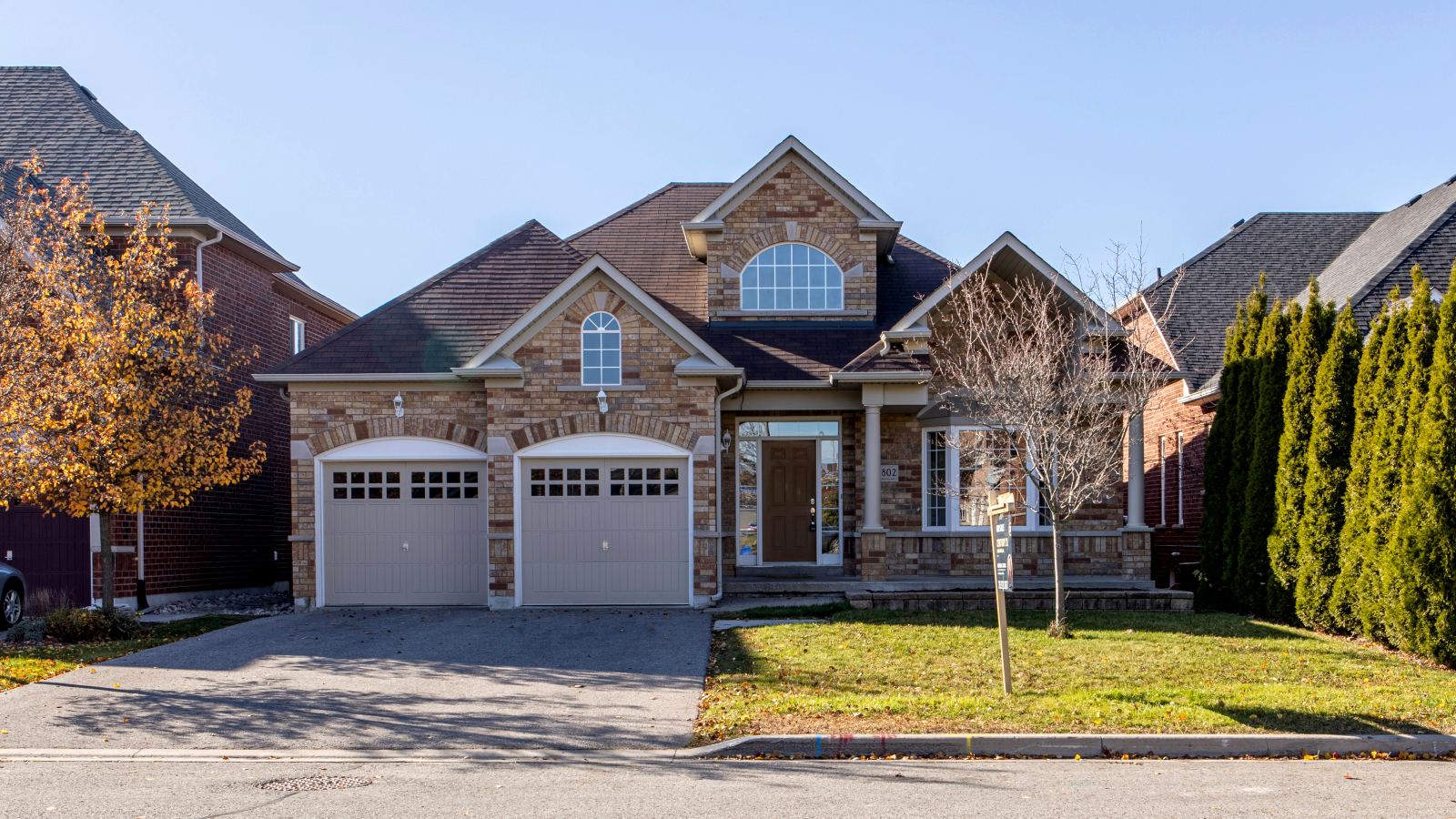 Suburban brick home with a double garage
