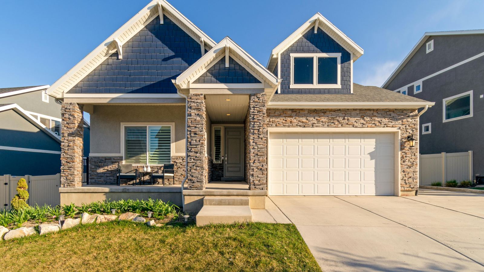 Craftsman-style home with a stone facade